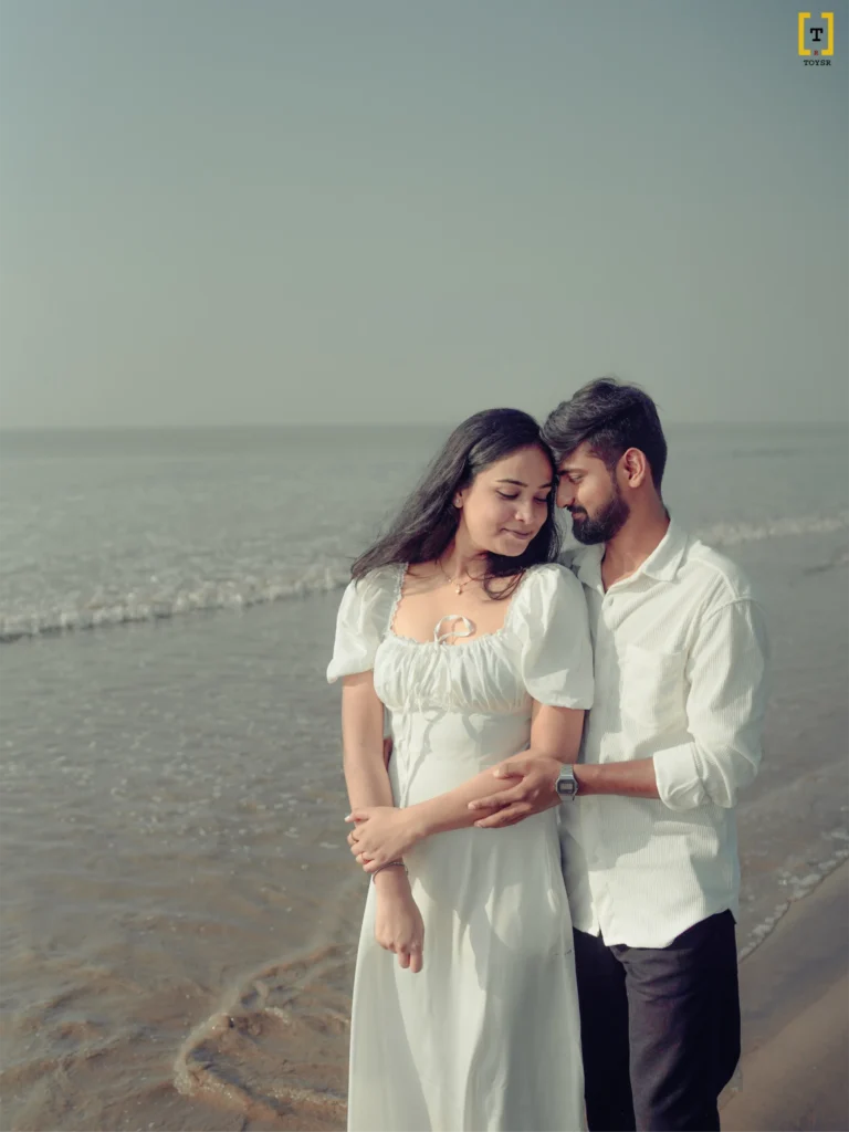 Candid image of a couple on the beach, Wedding photography styles