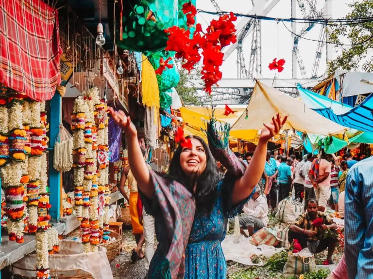 A girl tossing flowers in the air. pre-wedding shoot locations in Kolkata